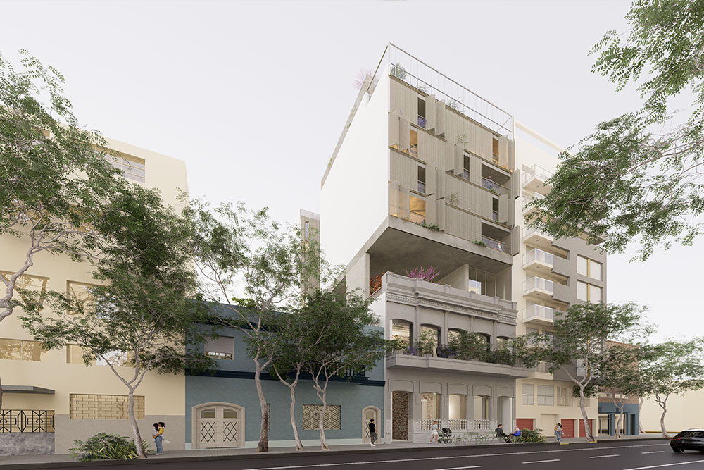 Patio interior de edificio moderno con pasarela, abundante vegetación, luz natural y personas recorriendo un espacio arquitectónico minimalista